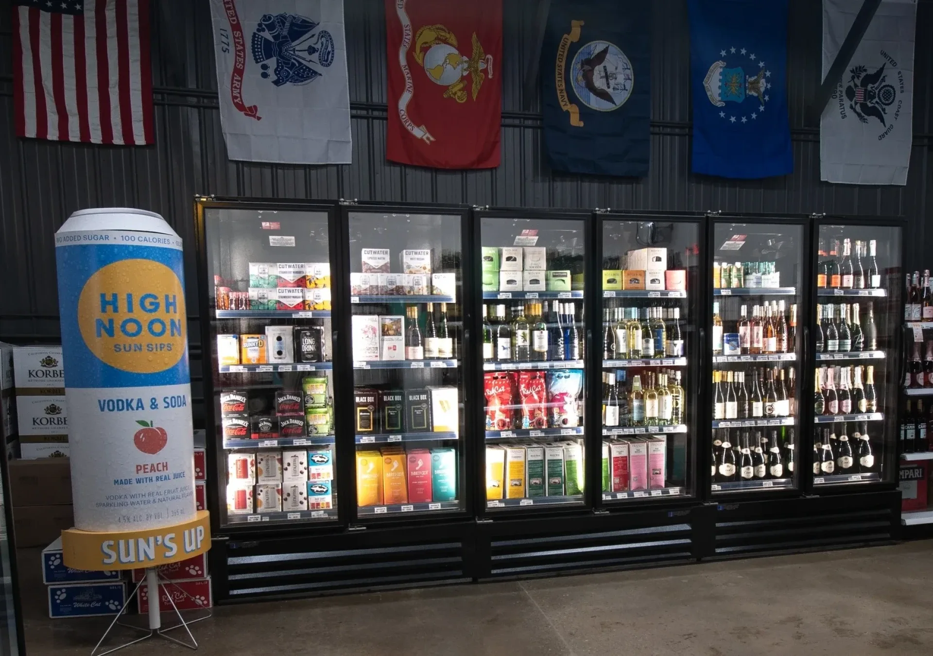 Refrigerated beverage cases inside Uncle Sam's Wine & Spirits